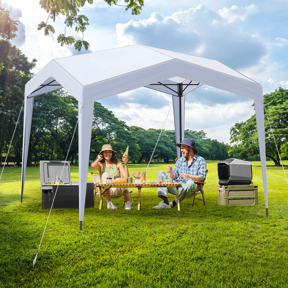 Pop up canopy tent in white with two people enjoying drinks, ideal for outdoor activities and sun protection.
