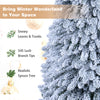Collapsible 6/7 FT artificial spruce tree with 545 snowy branch tips, perfect for holiday home decoration and easy setup.