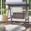 2-person porch swing with fir wood stand and tilt canopy, featuring removable cushions for outdoor relaxation.