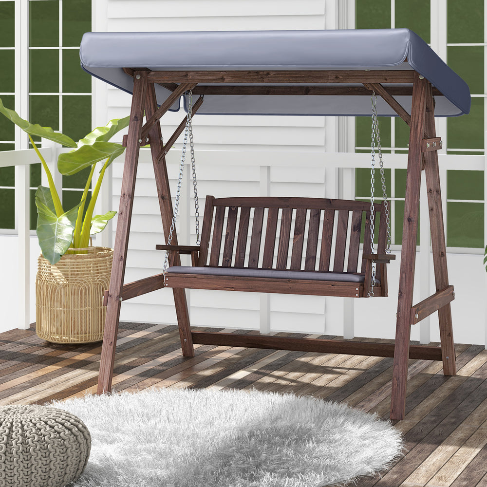 2-person porch swing with fir wood stand and tilt canopy, featuring removable cushions for outdoor relaxation.