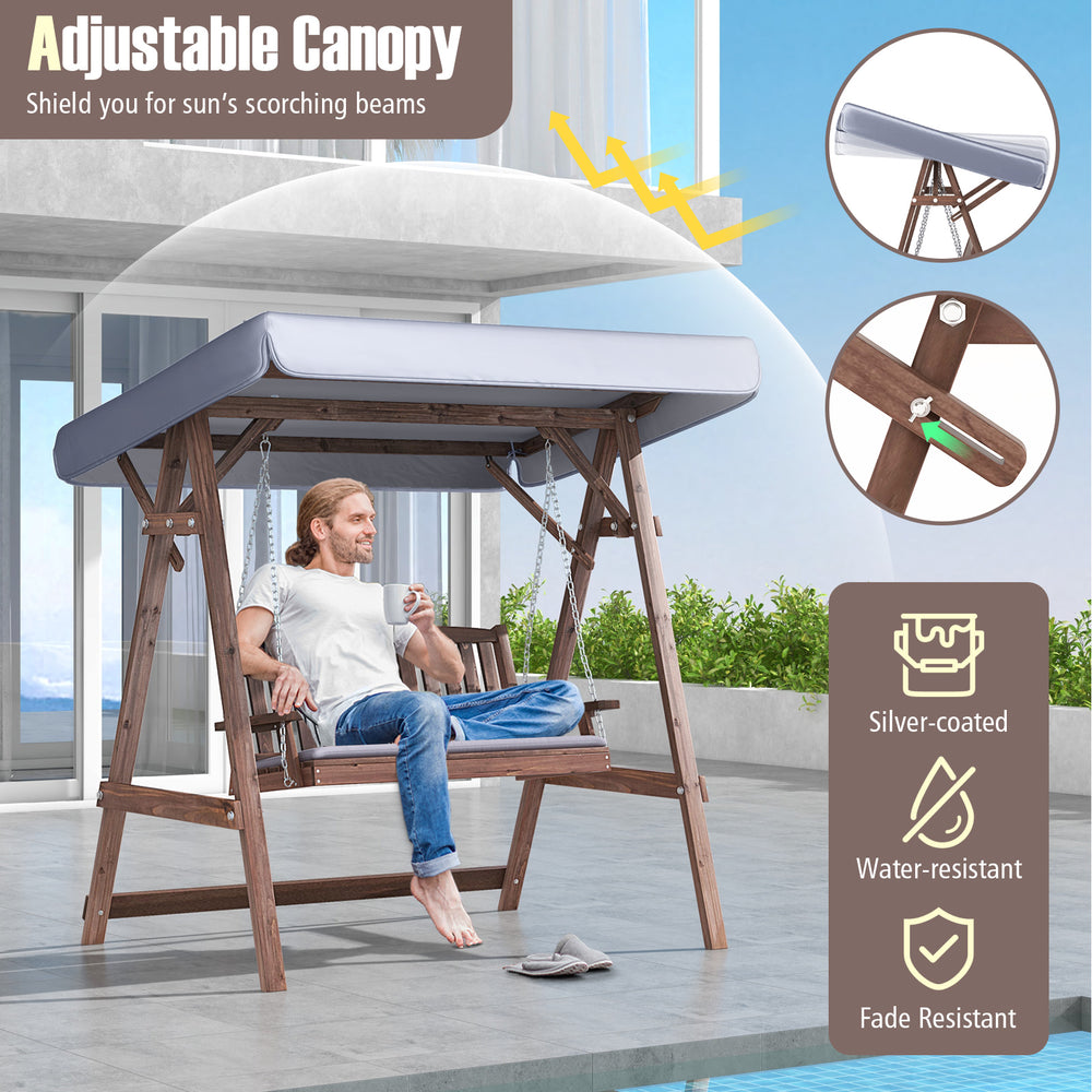 2-person porch swing with fir wood stand and adjustable silver-coated canopy for outdoor relaxation by the pool.
