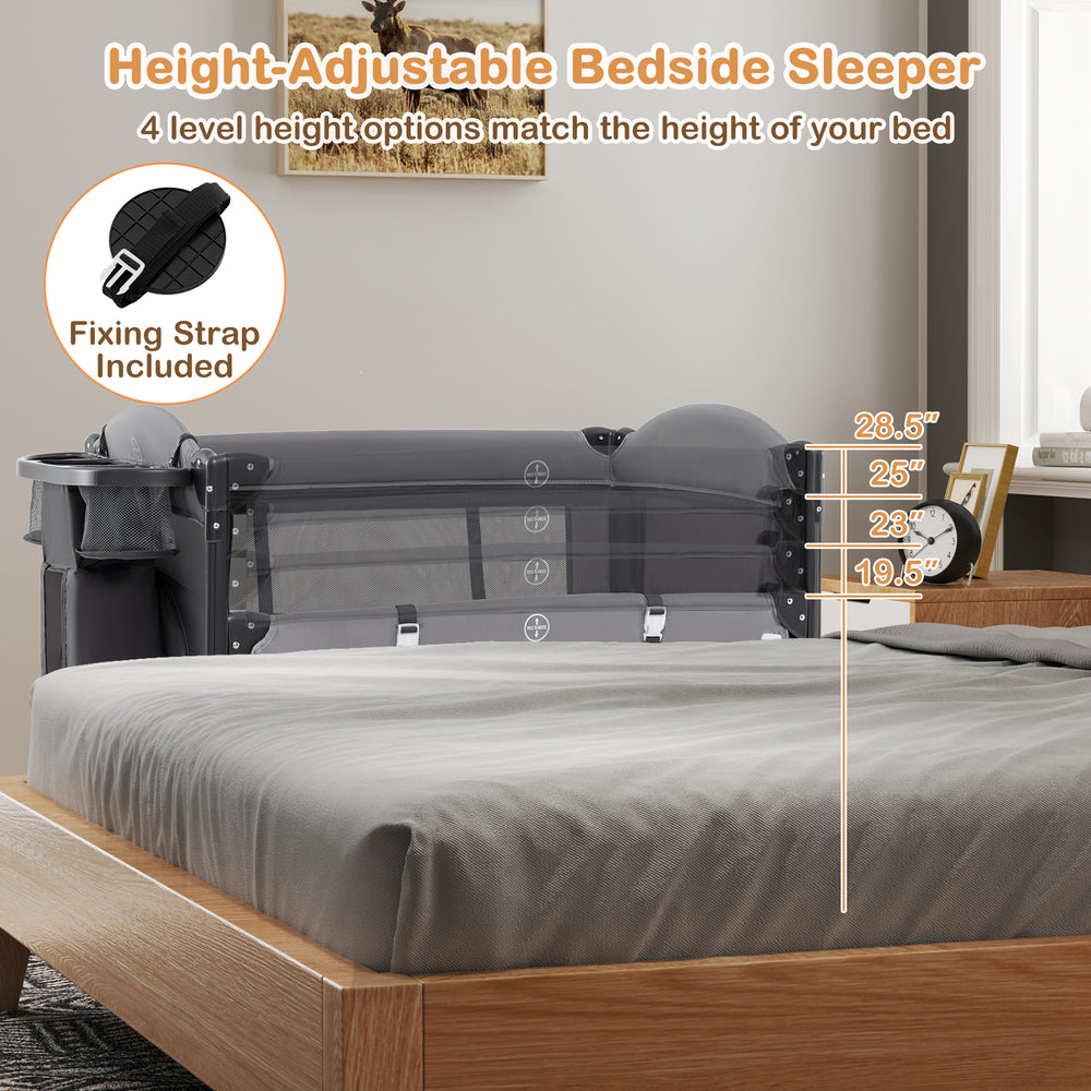 Height-adjustable bedside sleeper in gray with 4 levels, safety straps, and zip-open side door for easy baby access.