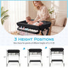 Portable baby changing table in black with 3 adjustable heights for comfortable diaper changing and convenient storage.
