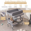 Portable baby changing table in gray with wheels, large storage rack, and adjustable height for convenient baby care.