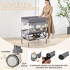 Portable baby changing table in gray with 360° swivel wheels and large storage rack for easy mobility and convenience.