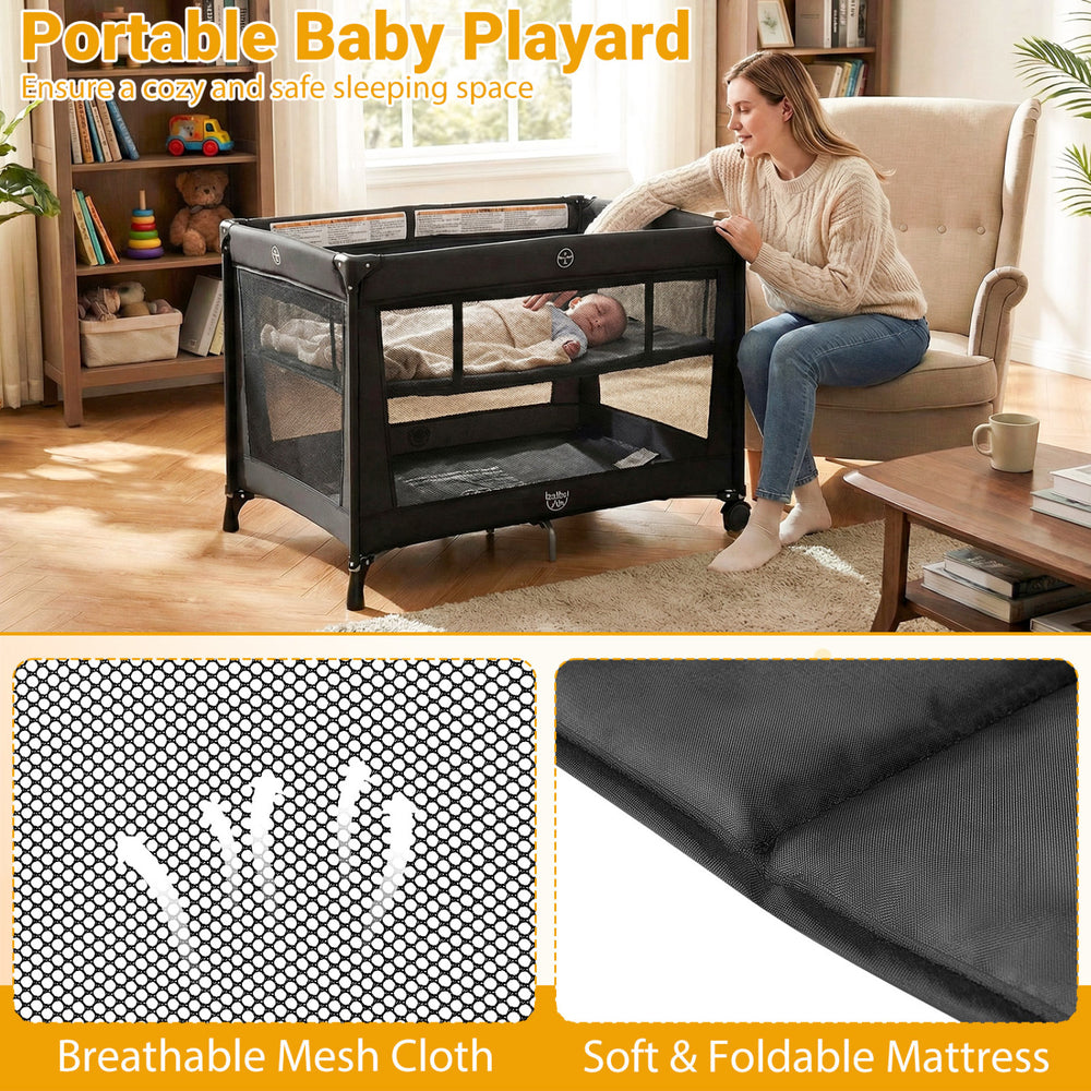 Portable baby playard in black with breathable mesh, foldable mattress, and child-safe design for cozy sleep and play.