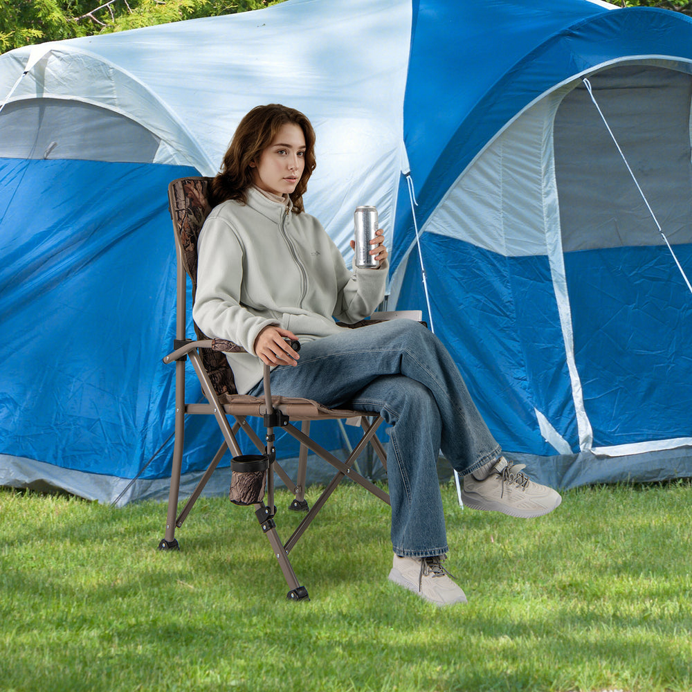 Portable camping chair with 400 lbs metal frame, featuring a cup holder, set up outdoors for camping comfort.