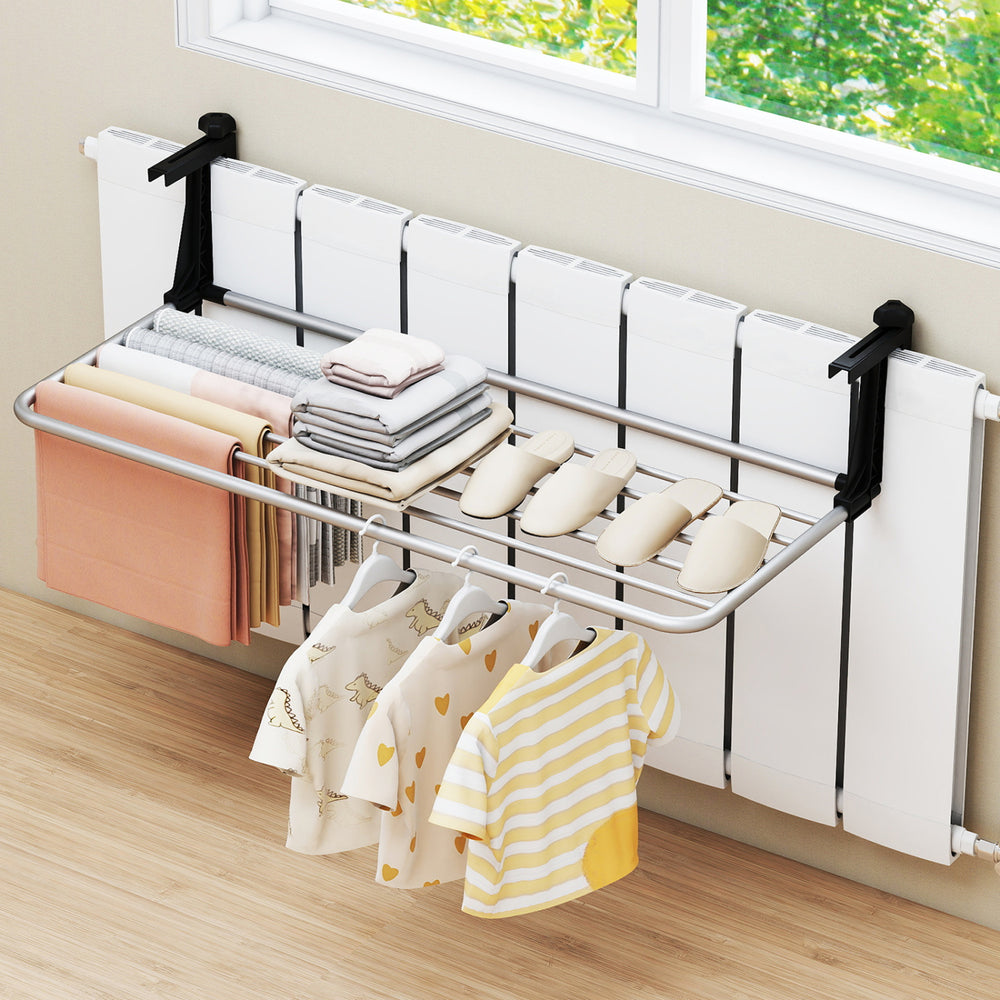 Portable clothes drying rack with aluminum frame, featuring spacious drying areas for socks, towels, and clothes.