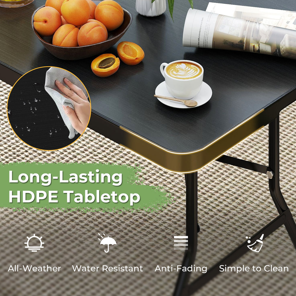 Portable folding camping table with a black HDPE tabletop, designed for easy setup and stability, ideal for outdoor use.