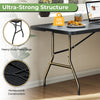 Portable folding camping table with heavy-duty metal legs and honeycomb construction, ideal for outdoor picnics and.