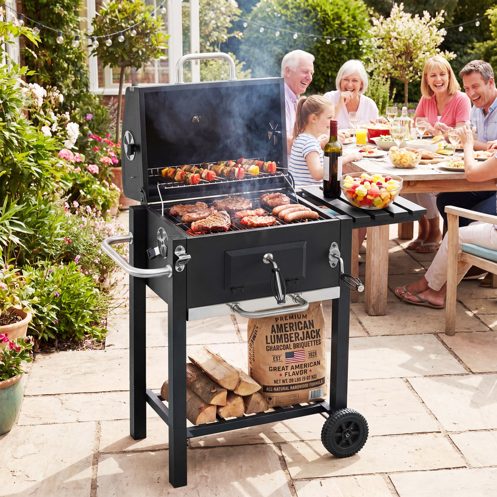 Portable outdoor barbecue grill in black with adjustable charcoal tray and wheels, perfect for outdoor cooking.