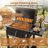 Portable outdoor barbecue grill with large cooking area, adjustable charcoal tray, and side shelf for tools and storage.