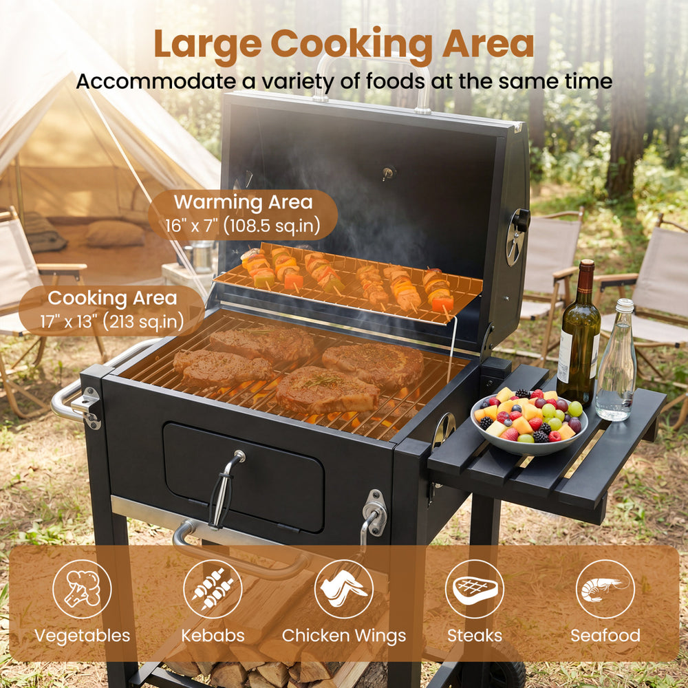 Portable outdoor barbecue grill with large cooking area, adjustable charcoal tray, and side shelf for tools and storage.