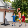 Portable outdoor basketball hoop with adjustable height, shatterproof backboard, and sturdy base for stability during play.