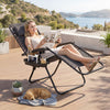 Portable zero gravity chair in gray with cup holder tray, adjustable pillow, and reclining feature for outdoor.