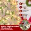 Snow flocked artificial Christmas tree with red berries and warm white LED lights, perfect for festive decor.