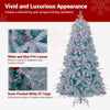 Pre-lit artificial Christmas tree with snow flocked branches, white and blue leaves, and frosted red berries for.