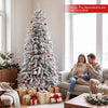 Pre-lit artificial Christmas tree with 440 warm white LED lights, featuring a snowy texture and elegant tiered design for festive decor.