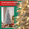 Pre-lit artificial Christmas tree with 280 warm white LED lights, featuring a tiered cypress-inspired look for festive elegance.
