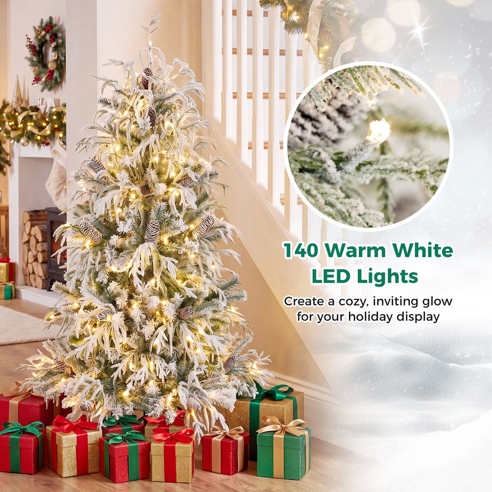 Pre-lit artificial Christmas tree with 140 warm white LED lights and snow flocking for a cozy holiday display.