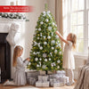 Pre-lit 4.5/7 FT artificial Christmas tree with 200/500 warm white LED lights, perfect for festive holiday decor.