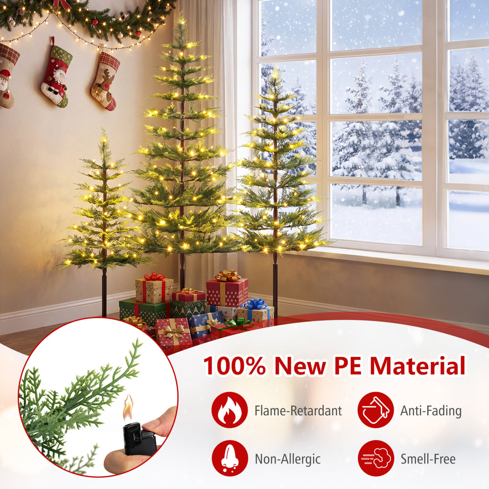 Pre-lit cypress Christmas tree set of 3 in green, featuring flame-retardant PE material and warm white LED lights.