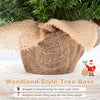 Linen-wrapped cement base of the pre-lit mini Christmas tree, shown in close-up with textured burlap for a natural look.