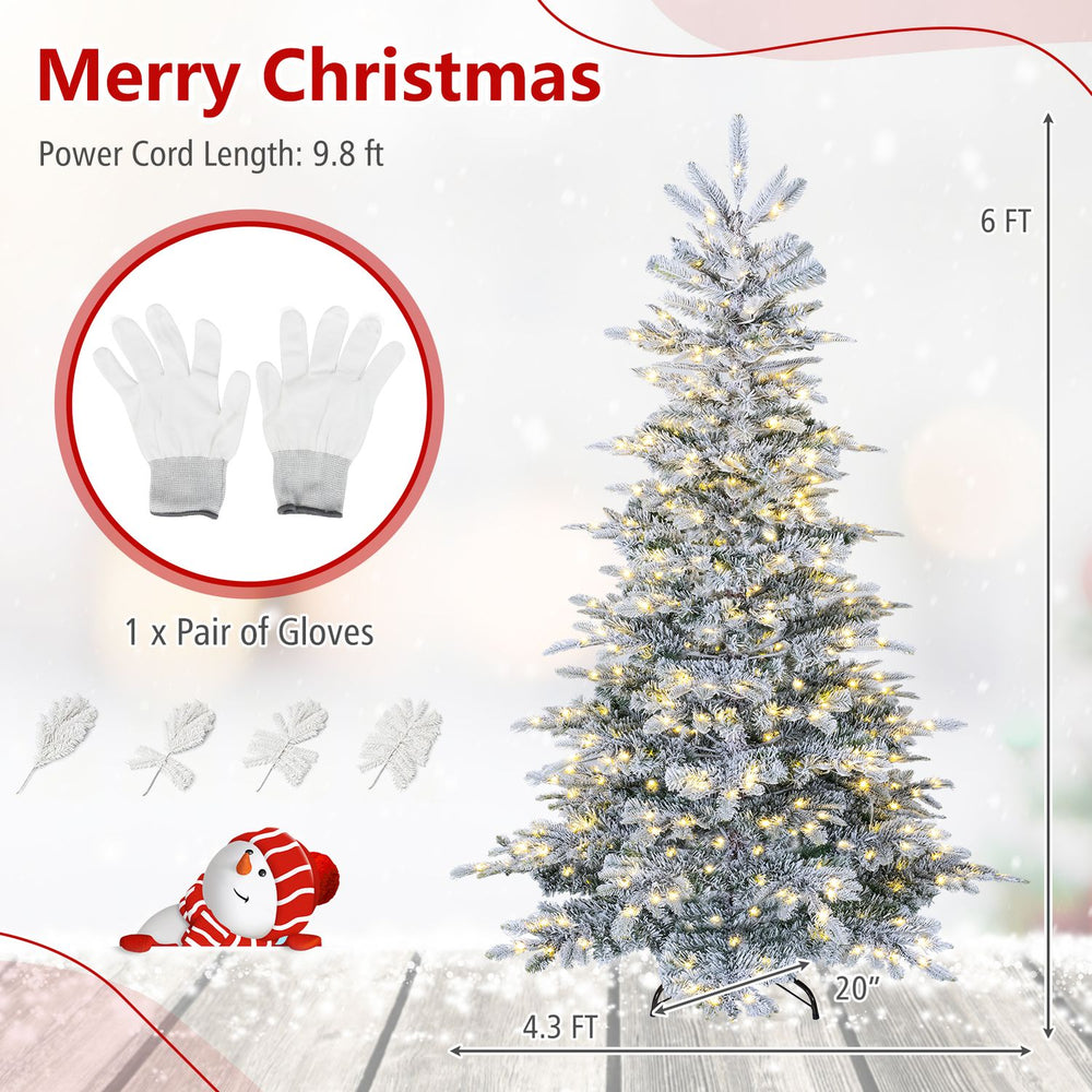 Snow flocked 6 FT pre-lit artificial Christmas tree with 500 LED lights, easy setup hinges, and included gloves for installation.