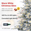 7/6 FT pre-lit snow flocked artificial Christmas tree with 420 LED lights and easy-setup hinged branches for festive decor.