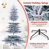 7/6 FT pre-lit snow flocked artificial Christmas tree with hinged connection for easy setup and a stable folding metal stand.