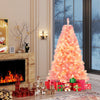 6ft pink pre-lit tinsel Christmas tree with warm white LED lights, surrounded by festive gifts and a cozy fireplace.