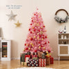Pink pre-lit tinsel Christmas tree with 688 lush branch tips and 250 warm white LED lights, perfect for holiday.