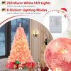 Pre-lit 6ft pink tinsel Christmas tree with 250 warm white LED lights and 8 lighting modes for festive decoration.