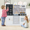 Children playing with a white pretend play kitchen featuring utensils, sink, oven, and a chalkboard for creative fun.