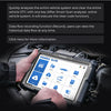 Hand holding Phoenix Elite diagnostic scanner with blue interface displayed over open vehicle engine compartment.