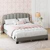Queen size bed frame with a scalloped tufted headboard in gray, styled with a cozy blanket and decorative pillows for.