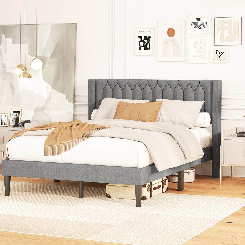 Gray upholstered platform bed showcasing a wingback headboard with soft Dutch velvet fabric, perfect for a stylish.