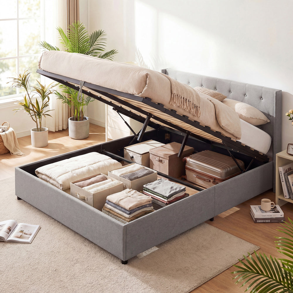 Queen size lift-up storage bed in gray with upholstered headboard, showcasing spacious under-bed storage for.