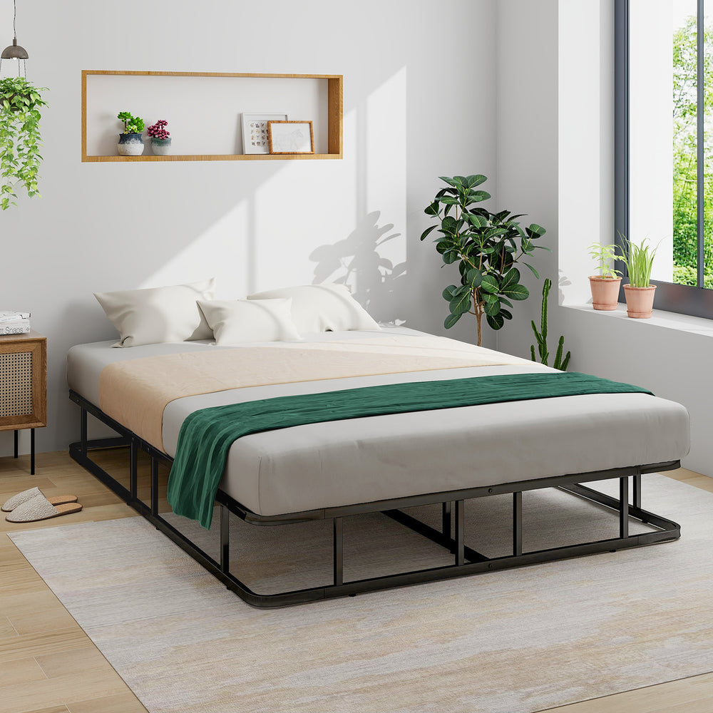 Queen size bed frame with metal slat support, showcasing its ventilated design and elegant style in a modern bedroom.