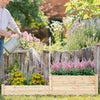 Watering vibrant flowers in the raised garden bed with trellis made of durable fir wood, showcasing two large planter.
