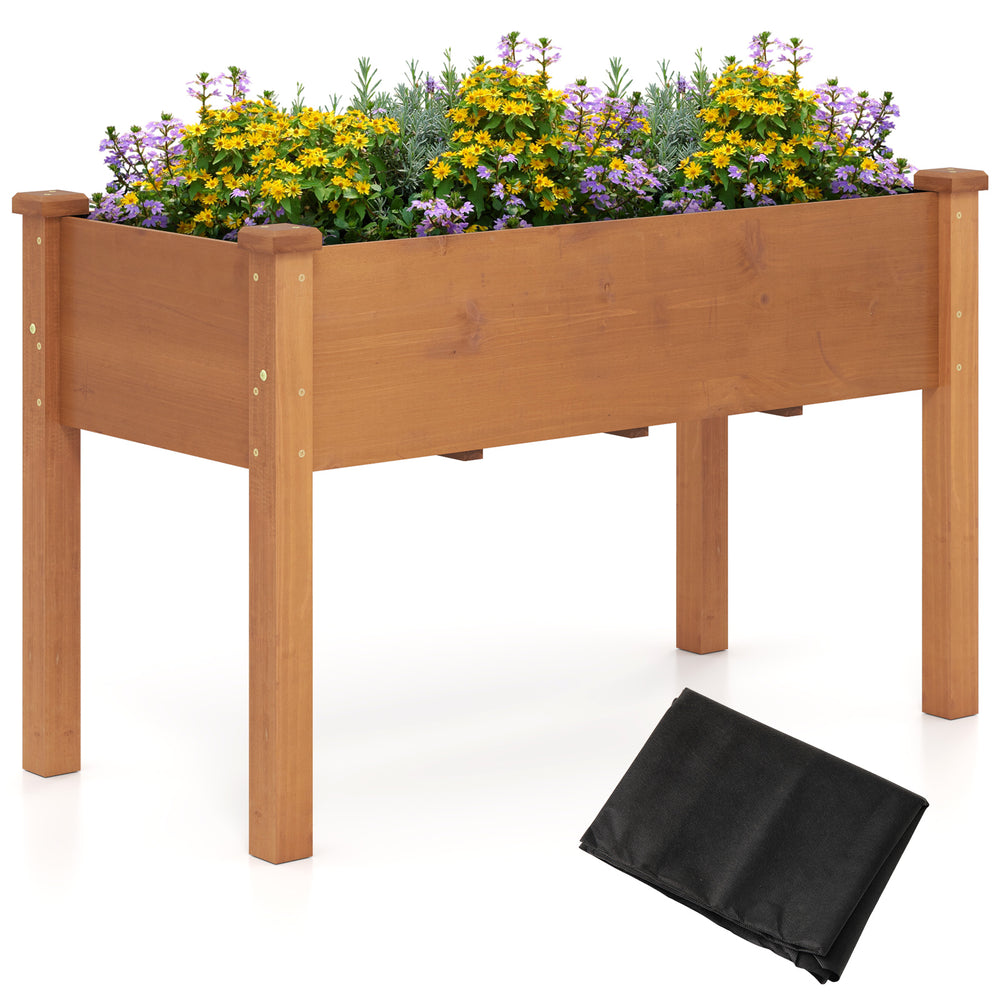 Raised garden bed with legs in brown wood, featuring drainage holes and a black liner, perfect for flowers and herbs.