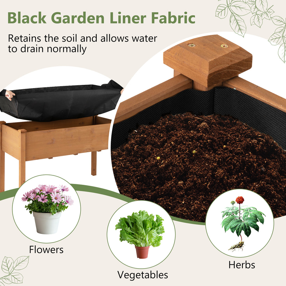Black garden liner fabric in a raised garden bed, designed for soil retention and drainage for healthy plant growth.