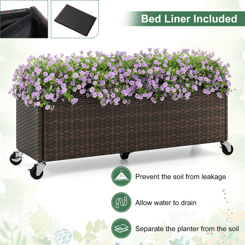 Raised garden bed planter box made of PE rattan with wheels, featuring a bed liner for soil separation and drainage.