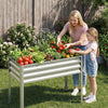 Large elevated planter box in silver with vegetables, perfect for comfortable gardening and enhancing outdoor spaces.