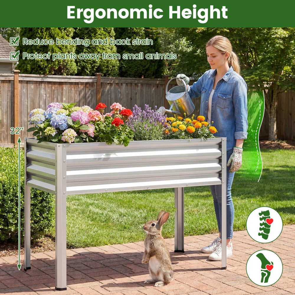 Large elevated planter box in silver, 32" height for comfortable gardening, ideal for flowers and veggies.