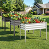 Three elevated metal raised garden beds in grey and white, perfect for growing vegetables and flowers in any outdoor.