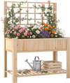 Wooden raised garden bed with trellis, featuring vibrant flowers, slatted shelf, and elevated design for easy gardening.