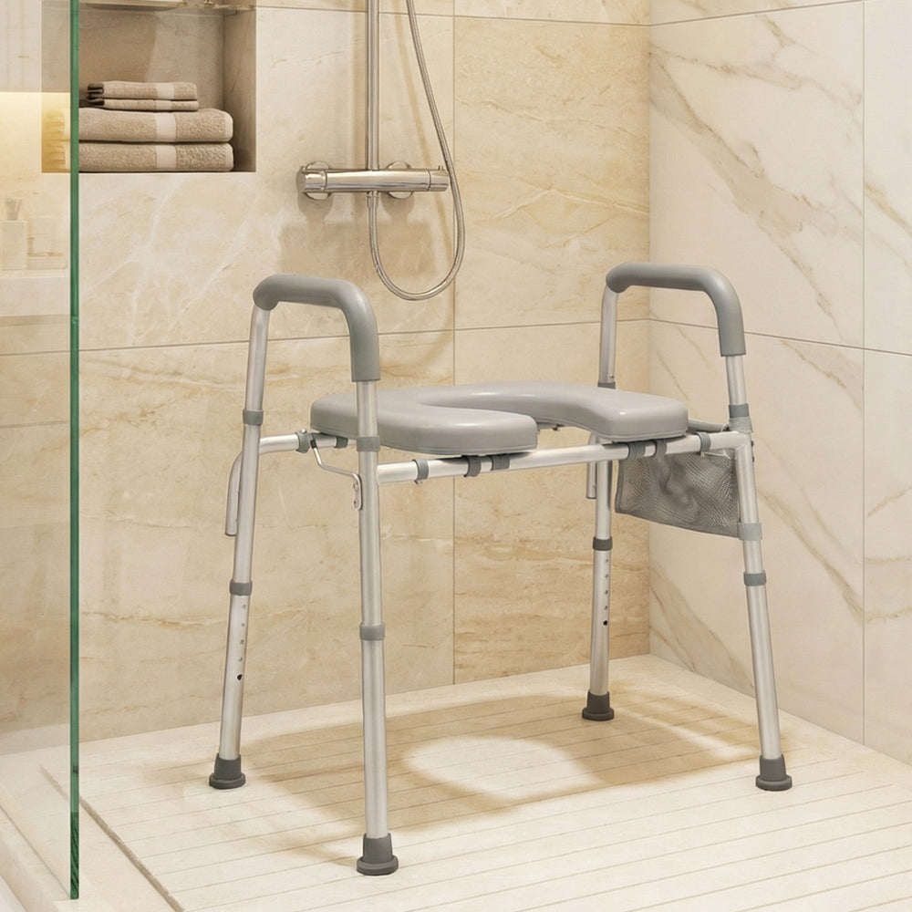 Raised toilet seat with handles and padded arms, adjustable height, ideal for seniors, used as a shower chair.