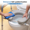 Waterproof soft-padded cushion on a raised toilet seat with handles, designed for comfort and easy cleaning.