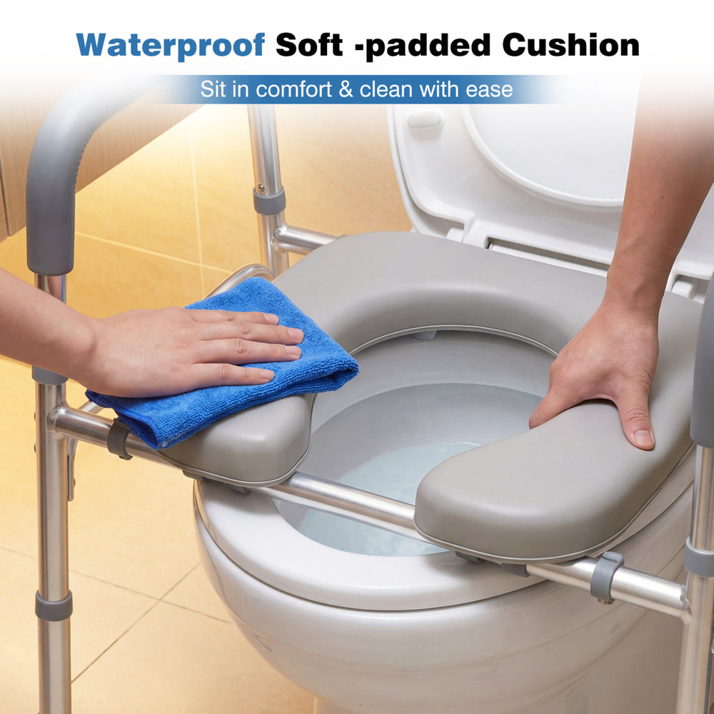 Waterproof soft-padded cushion on a raised toilet seat with handles, designed for comfort and easy cleaning.